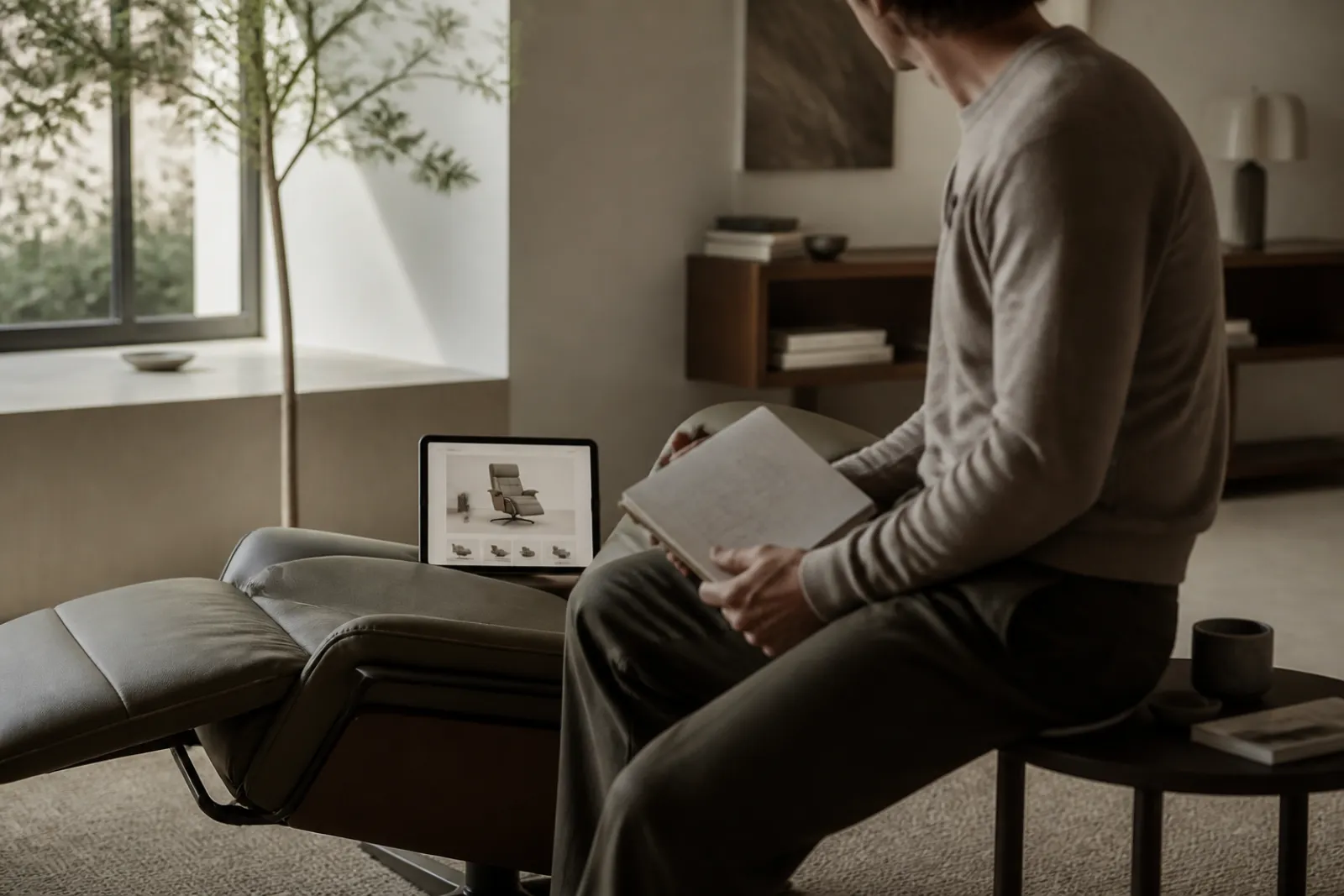 Shopper comparing oversized recliner options and measurements before buying